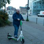 What is your job in transportation? – E-Scooter Juicer Christian Krakau-Louis on a scooter