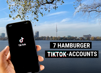 Diesen 7 Hamburger TikTok-Accounts solltest du folgen Handy in der Hand mit TikTok App und Hamburger Skyline im Hintergrund