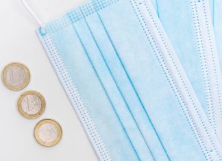 Hamburg fordert knapp 84 Millionen Euro Corona-Hilfen zurück Corona-Hilfen: Geldmünzen und Schutzmasken