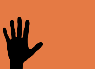 Mehr Hasskriminalität – vor allem aus der rechten Ecke Symbolbild: Hasskriminalität Hamburg. Eine ausgestreckte Hand vor orangenem Hintergrund