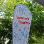 Ein Schild mit der Aufschrift: Sprachcafé Eimsbüttel