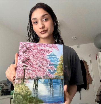 Codes für die Kunst: Kreative über KI Die Hobby-Künstlerin Nika Basseri mit ihrem Acrylgemälde.