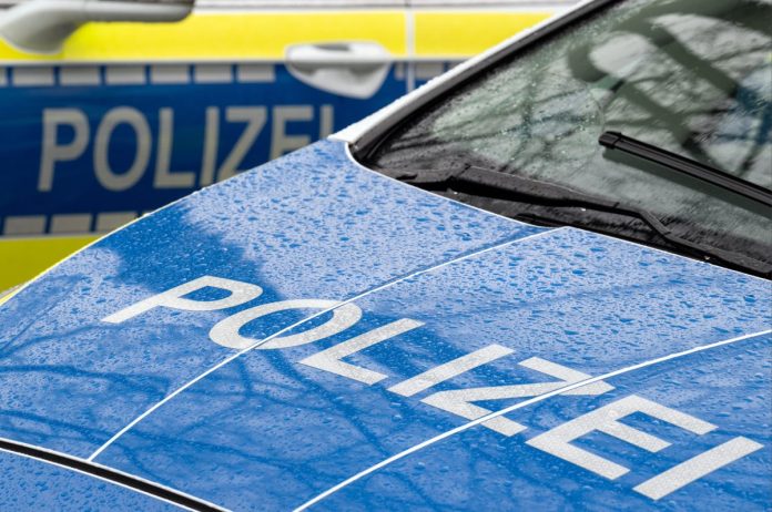 Polizeiauto Nahaufnahme von zwei Polizeiwagen. Blaue Lackierung mit